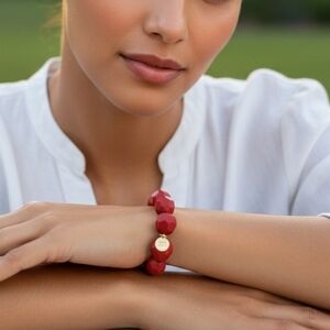 Red Bead Bracelet with gold charm